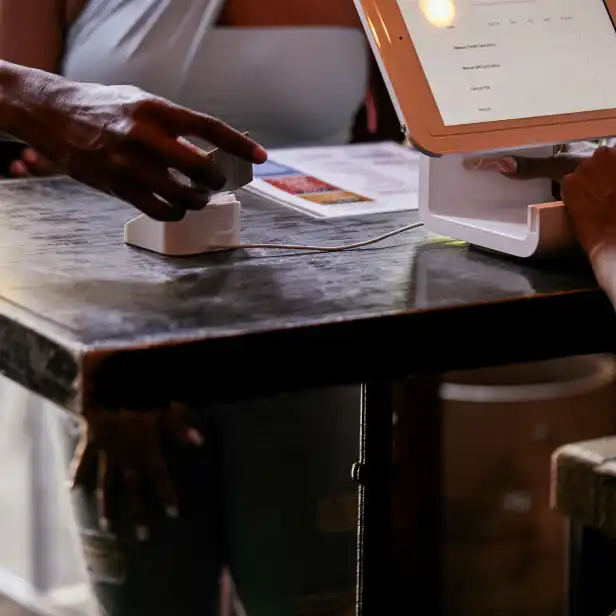 Customer inserts chip card into Square reader for contactless and chip 